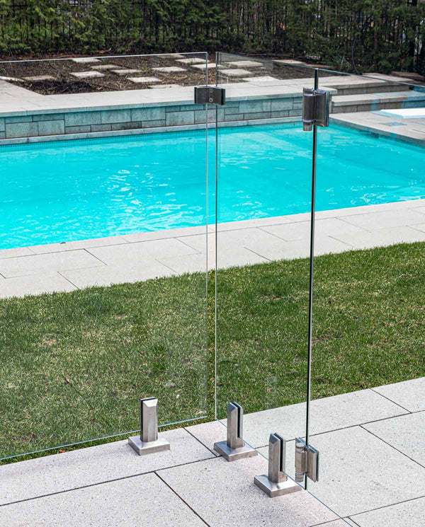 Core drill spigot for pool fence